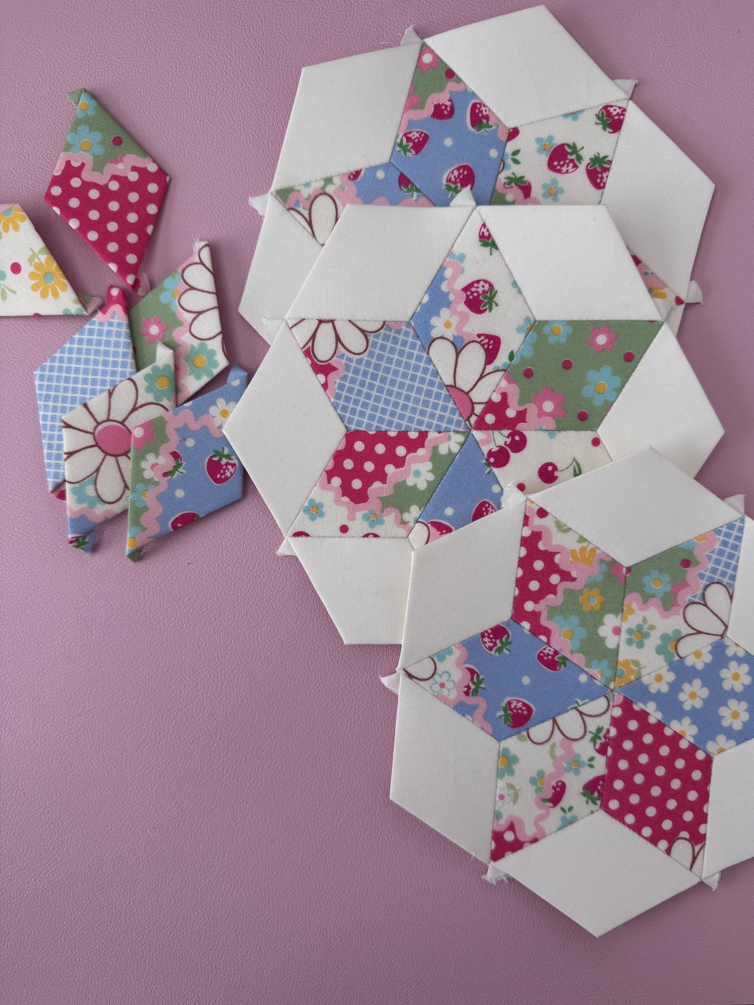 English paper pieced diamonds turned into hexagon blocks